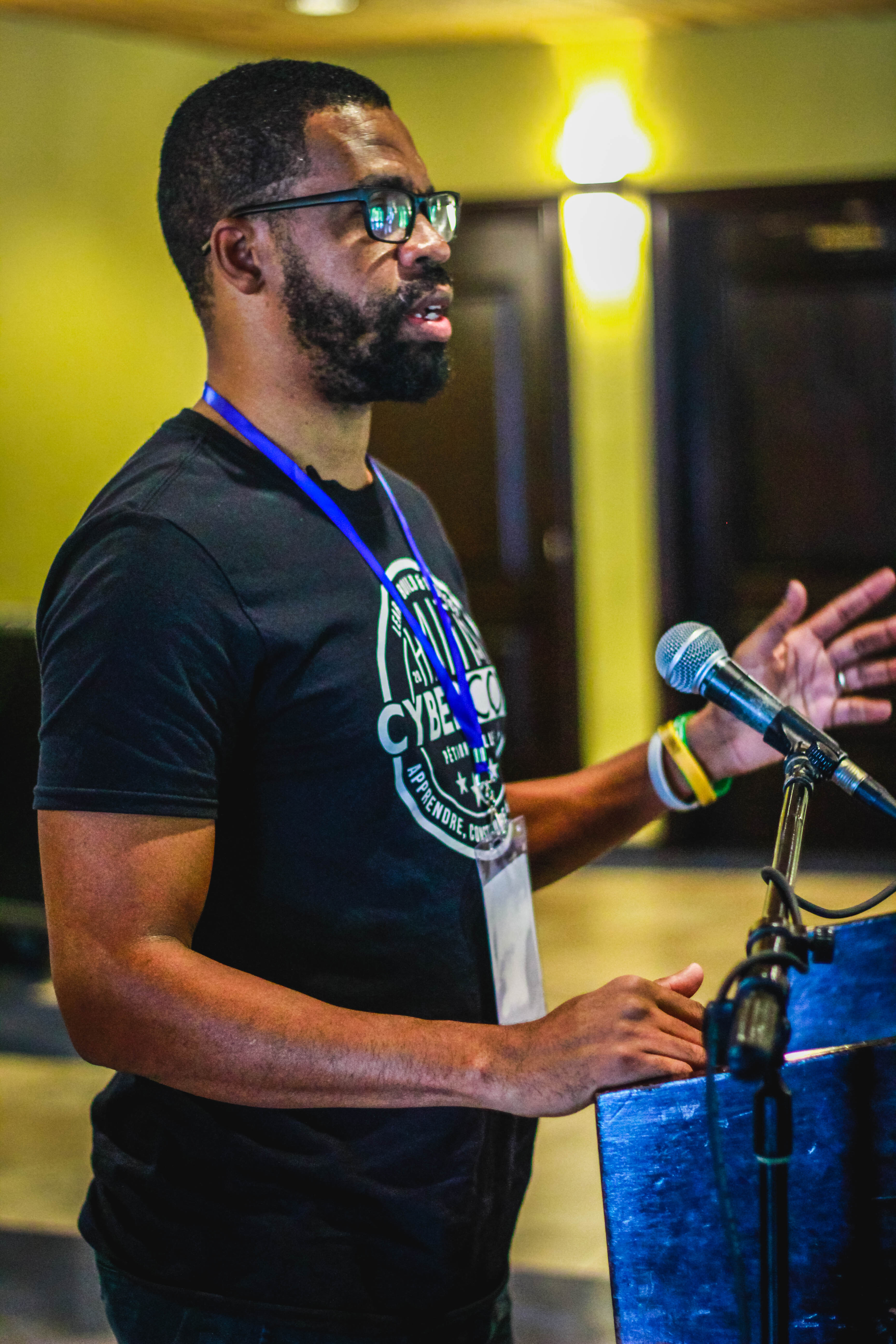 Mike Arbrouet speaking at an event
